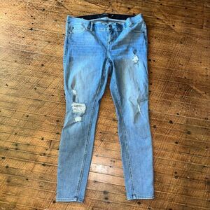 Torrid Bombshell high rise distressed slimming ankle skinny jeans